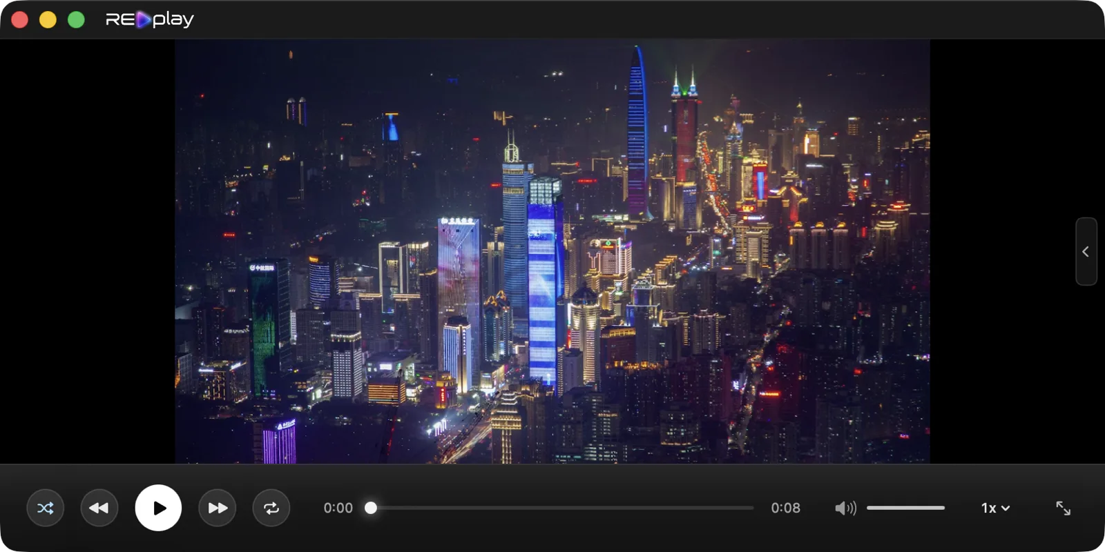 RE:play playing a night-time city skyline video, with transport controls along the bottom of the window.